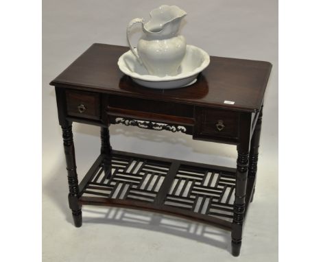 A Chinese rosewood wash stand,with 2 short frieze drawers, turned legs and shelf below, complete with a Meakin's Ironstone ce