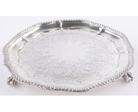 A Victorian silver card salver,cast shaped bead edge on ball and claw feet, by Henry Wilkinson, London 1868, 12.9 oz, diamete