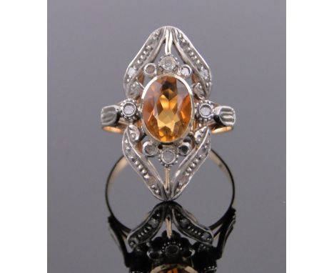 A citrine and diamond set panel ring,circa 1930s, indistinct continental hallmarks, panel height 22mm, size M.