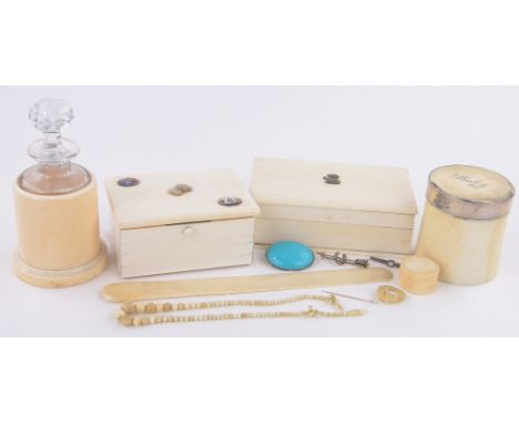 A group of 19th century ivory items,including 2 trinket boxes, glass perfume bottle in cylindrical ivory stand, ivory jewelle