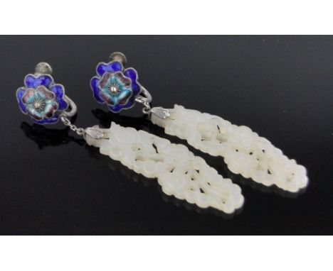 A pair of Chinese carved and pierced jade pendant earrings,with unmarked silver and coloured enamel screw-on fittings, 65mm.