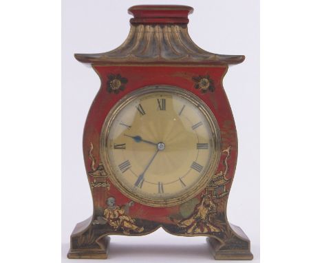 A chinoiserie gilded red lacquer cased pagoda shaped mantel clock,French made 8-day movement, height 20cm.