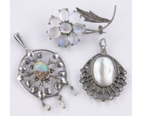 A moonstone and silver flower design brooch,an opal and silver pendant and paste and pearl set pendant, (3).