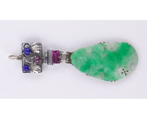 A Chinese 18ct white gold Art Deco carved and pierced jade and multi-coloured gemstone set pendant,length 52mm.