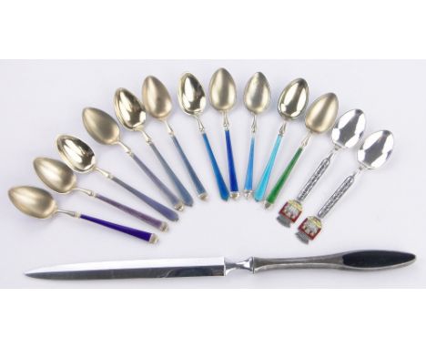 A group of silver and enamel items,including paperknife and various spoons.