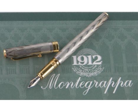 A Montegrappa silver and gold fountain pen,original box.