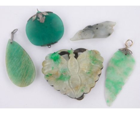 A group of Chinese carved jade pendants, (5).