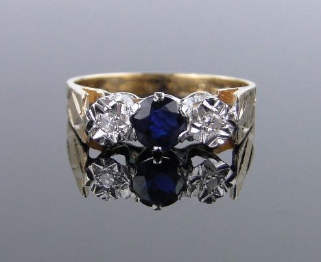 An 18ct gold 3 stone sapphire and diamond ring,size M.