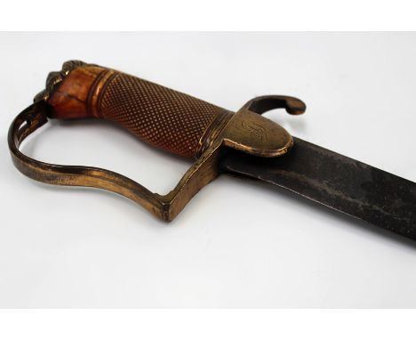 A Georgian Light Cavalry Officer’s sabre, 80cm curved blade, worn, copper gilt stirrup hilt, the langet engraved with the own
