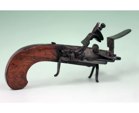 An antique flintlock Tinder lighter.