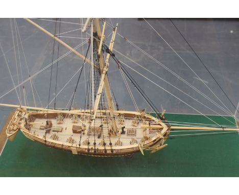 A fine museum quality scratch built scale model of H M Cutter “Surly”. By M Puttock. Fully rigged. 76cm long. Cased.