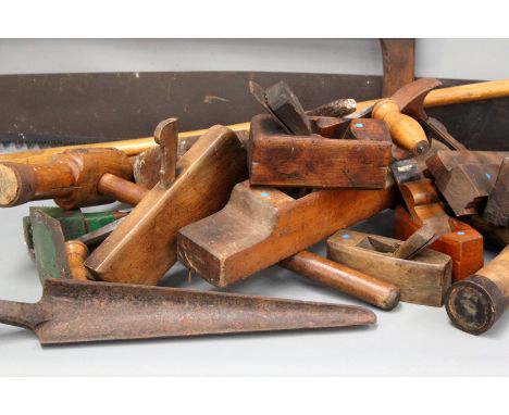 A large antique fitted pine ships carpenters tool chest together with various related tools.
