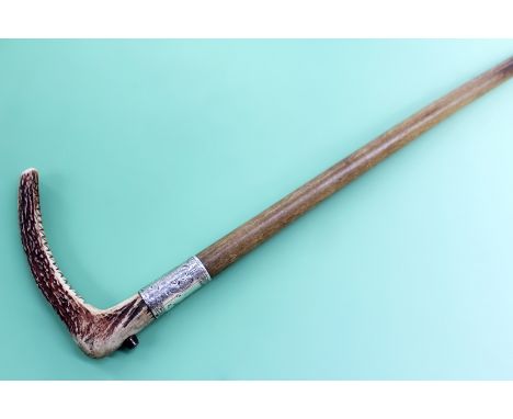 A similar rhinoceros horn crop with silver coloured mounts. Birmingham 1903 70cm long.
N.B.Non EU buyers please note that it 