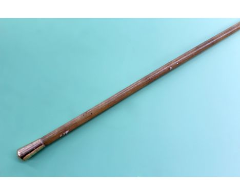 A rhinoceros horn riding crop with gold coloured mount. Dated 1863 69cm long.
N.B.Non EU buyers please note that it is unlike