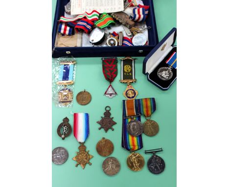 A First War Pair of medals, to 63778 PTE. R. CORORAN. N. CYCLIST. BN., together with a First War Pair of medals to 1625 GNR. 