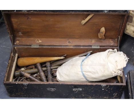 An Antique pine sailmakers tool box and various related tools. A sail and length of rope.