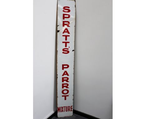 An enamel advertising sign. “Spratts Parrot Mixture”. 28 x 199cm.