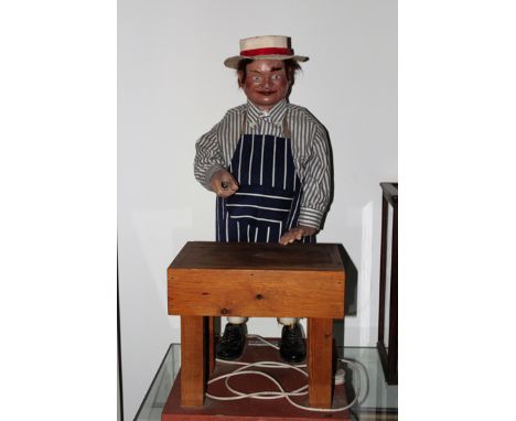 An interesting advertising automaton in the form of a butcher. Labelled “J H Animation”.