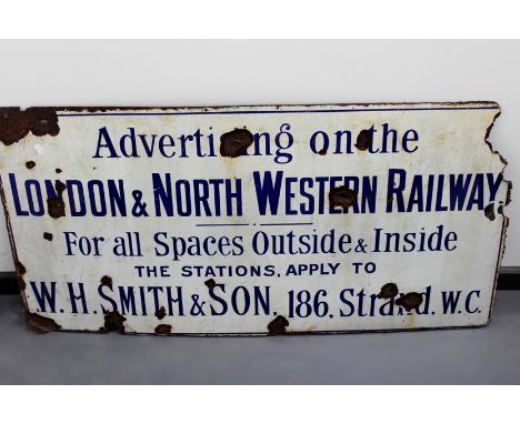 An enamel sign “Advertising on the London and North Western Railway - For spaces outside and inside the stations apply to WH 