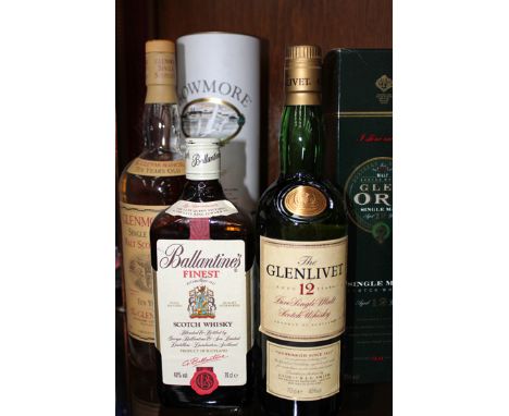 Bowmore surf single malt Scotch whiskey together with Glen Ord single malt, Glenlivet single malt, Glenmorangie and Ballantin