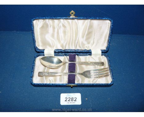 A cased Christening spoon and fork, Sheffield 1960, makers Emile Viner, 45 grams.