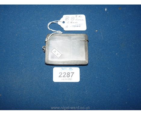 A large Birmingham silver vesta by John Rose, engine turned pattern, hinge good, initialled "TC", made in 1925 (44.9 gms) and