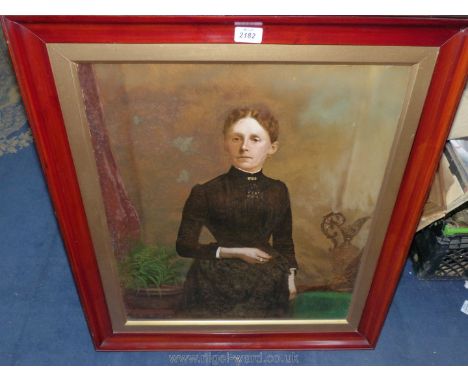 A large wooden framed oil on canvas portrait of an Edwardian lady, hand written label verso 'Mary Smith 18/6/1849 - 7/5/1930'