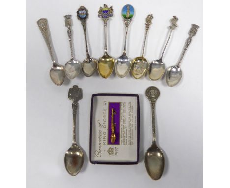 EARLY TWENTIETH CENTURY GOLF RELATED TEASPOON, the oval finial with image of a lady golfer on an enamel ground, Birmingham 19