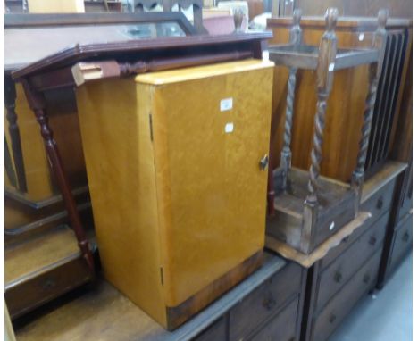 AN OAK OBLONG OCCASIONAL TABLE ON SPIRALLY TWISTED LEGS, A MAHOGANY COFFEE TABLE (A.F.) AND AN LIGHT OAK BEDSIDE CUPBOARD (3)
