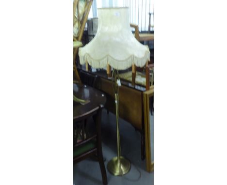A SATIN BRASS STANDARD LAMP AND SHADE 