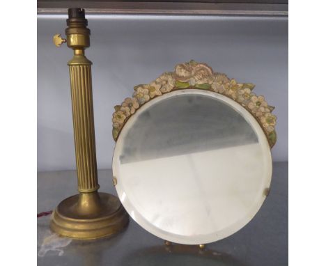 A CIRCULAR BARBOLA EASEL MIRROR, A BRASS COLUMN TABLE LAMP AND A METAL WEATHER VANE  (3) 