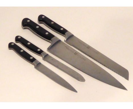 FOUR ZWILLING J.A. HENCKELS KITCHEN KNIVES TO INCLUDE; A CHEFS KNIFE, A BREAD KNIFE AND TWO PARING KNIVES (4)