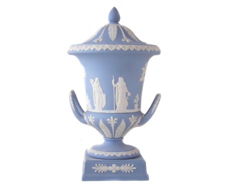 Wedgwood jasper ware lidded vase of campana shape decorated with classical figures on a light blue ground, impressed marks to