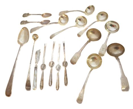 A selection of George III and later silver cutlery, to include eight silver sauce ladles, mostly fiddle pattern, a George III