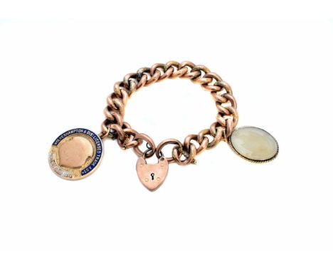 A charm bracelet, the flat curb link chain with engraved and polished links, stamped 9c, suspending a 1930s 9ct gold and enam