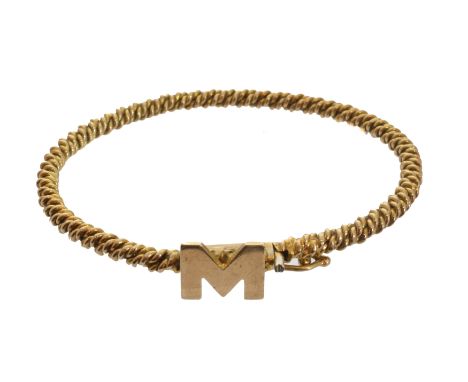A 9ct gold initial bangle, the polished 'M' atop the rope twist bangle, stamped 9ct, length of inner diameter 5.5cm, gross we