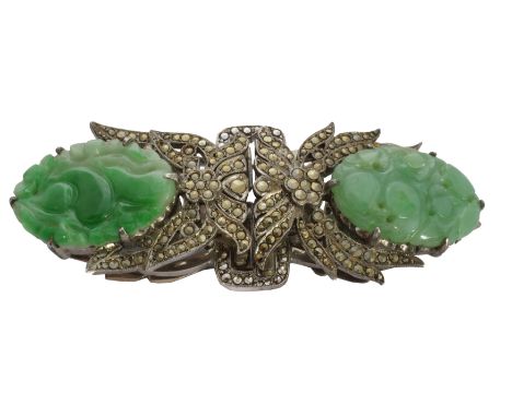 A jade and marcasite double clip brooch, designed as a carved jade duo, depicting fruits and gourds, within a marcasite folia