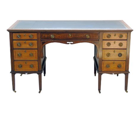 Edwardian mahogany writing desk, rectangular top with green leather inset, covered with plate glass, base with two stacks of 