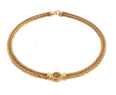An 18ct gold citrine necklace by Wellendorff, the circular citrine collet with grooved sides, inset to the double rope link c