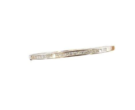 An 18ct gold diamond hinged bangle, the square shape diamond line within a channel setting, to the plain polished reverse, ha