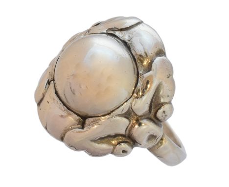 A Georg Jensen silver ring - pattern 11a, the polished dome within a foliate surround, stamped STERLING DENMARK and 11A, make