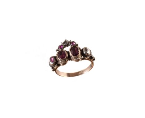 A foil back ruby and diamond dress ring, the oval shape foil back ruby duo with an oval shape ruby and rose cut diamond coron