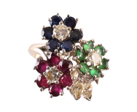 A vari gem cluster ring, the trio of brilliant cut diamond and circular shape ruby, emerald and sapphire floral clusters with