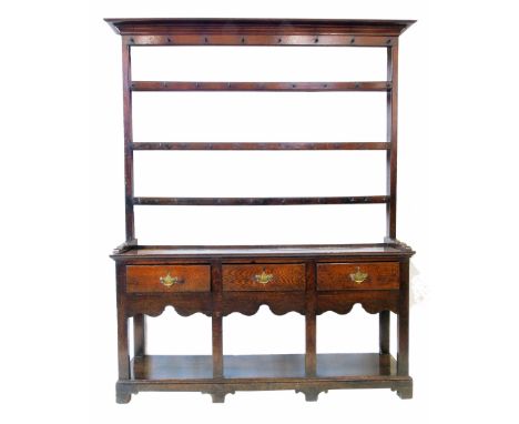 18th century oak dresser, three shelf rack sitting on base with three drawers, rectangular section supports with pot shelf, w