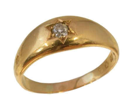 A late Victorian diamond single stone ring retailed by Wartski, the old cut diamond star set within the tapered band, hallmar