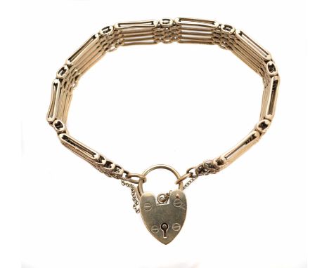 A 9ct gold gate-link bracelet, the gate-link chain with textured brick-link spacers and a heart shape padlock clasp, hallmark