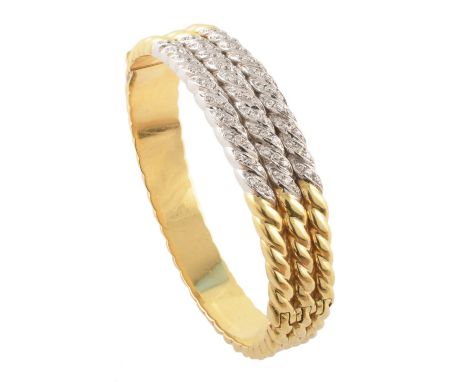 A diamond hinged bangle, of bi-colour design, the brilliant cut diamond rope twist front with similar polished sides and hing