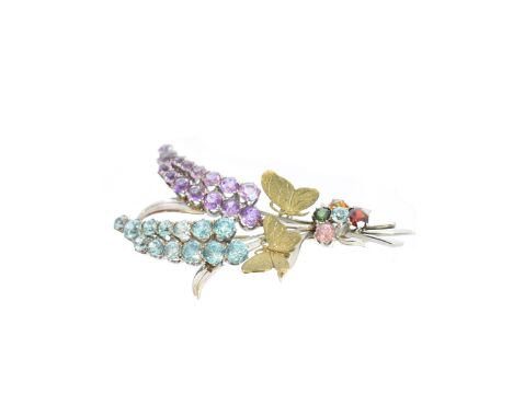 A Cropp &amp; Farr multi-gem spray brooch, the circular shape zircon and amethyst floral sprigs with textured butterfly accen