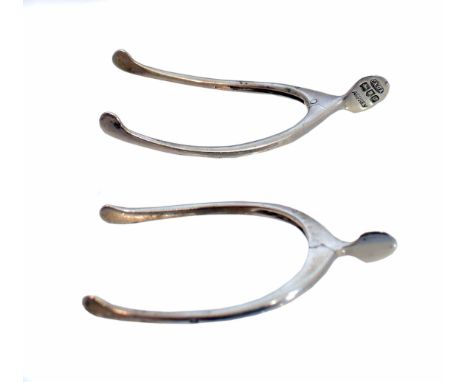 Two early 20th Century silver sugar nips, to include an Edwardian Asprey example together with a 1930s pair, hallmarks for Lo