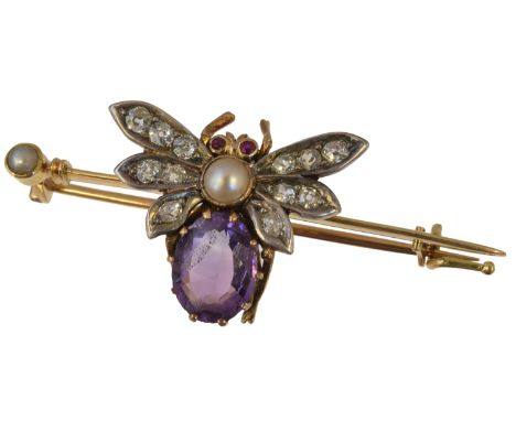 A vari gem bug brooch, the bug with oval shape amethyst and split pearl body, ruby eyes and old cut diamond wings, atop the p